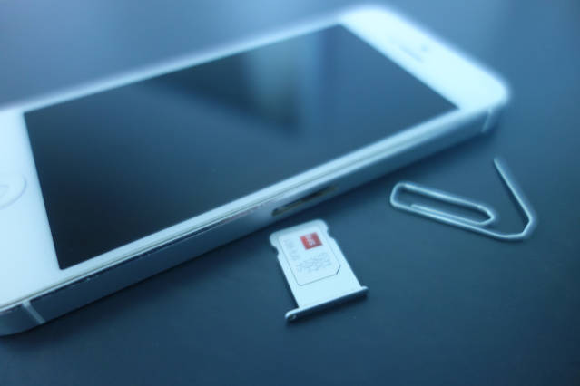 You can easily swap SIM cards with a paper clip