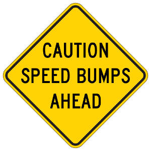 Speed bumps ahead U.S. road sign
